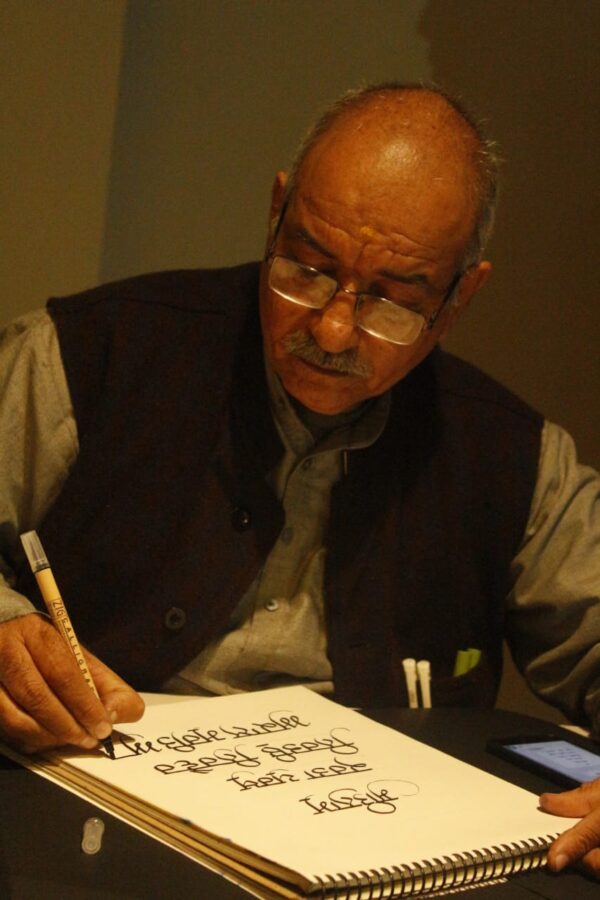Man practicing calligraphy